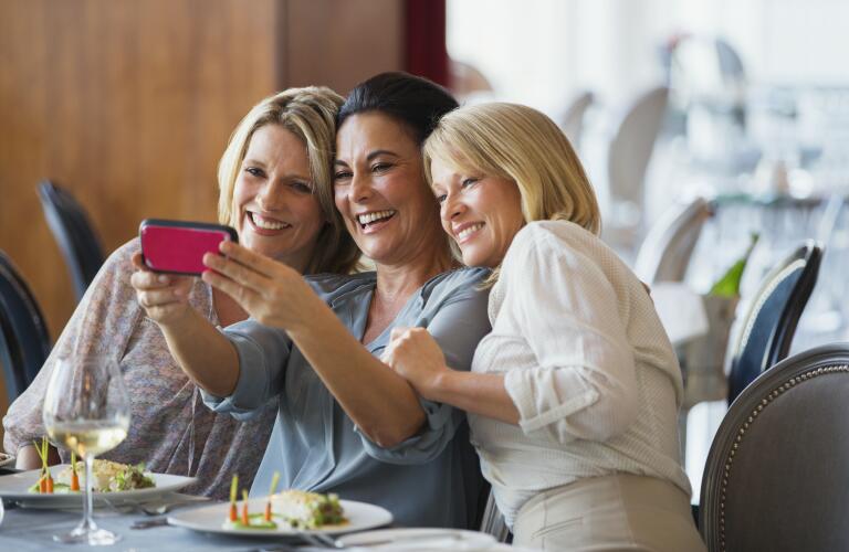 Women taking selfies