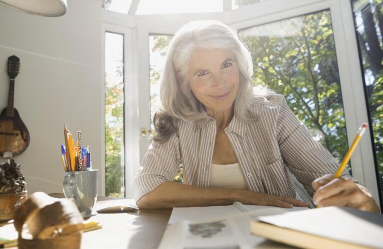 Older woman writing