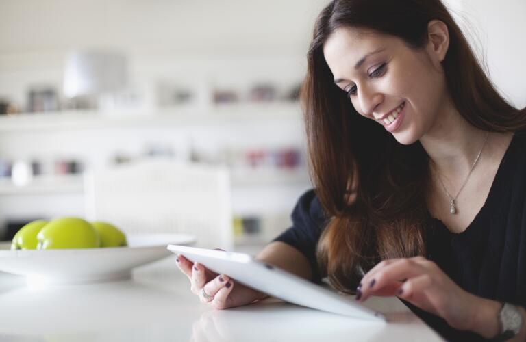 Young woman looking at a tablet