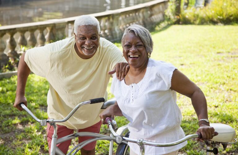 enior-african-american-couple-riding-bicycles