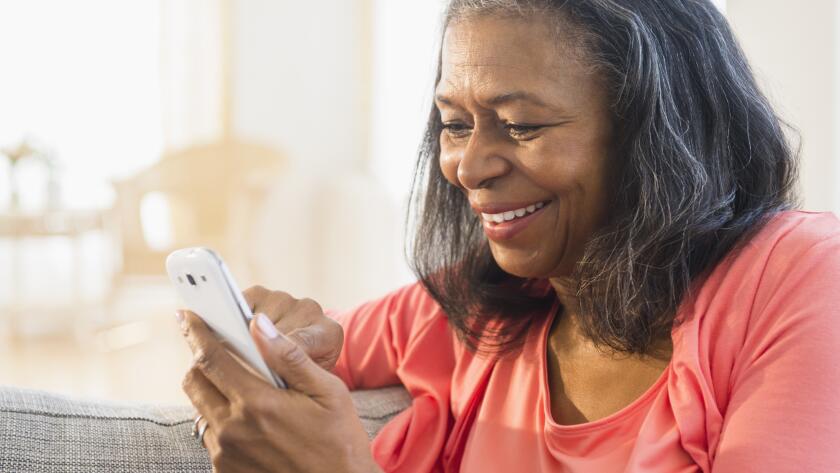 senior woman using smartphone