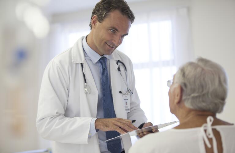 Senior patient and doctor