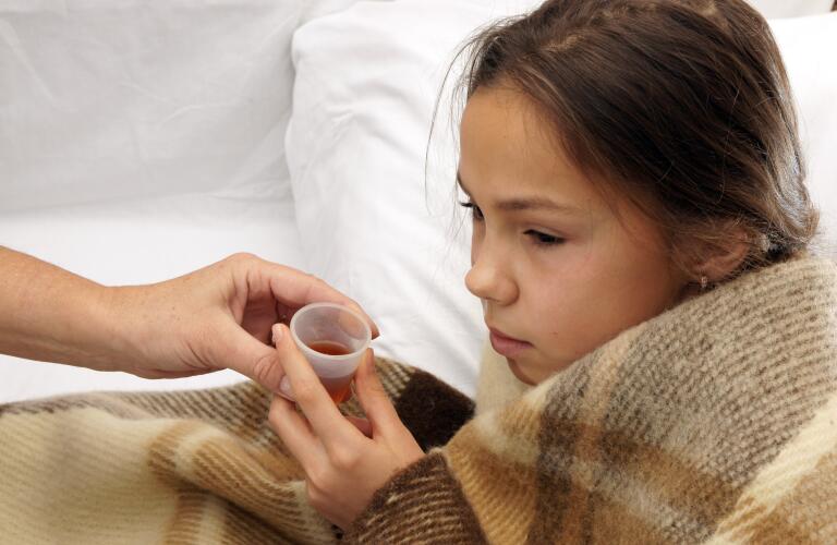 girl-taking-medicine