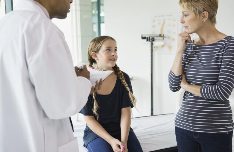 parent talking to doctor