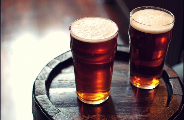 two pints of beer in pub