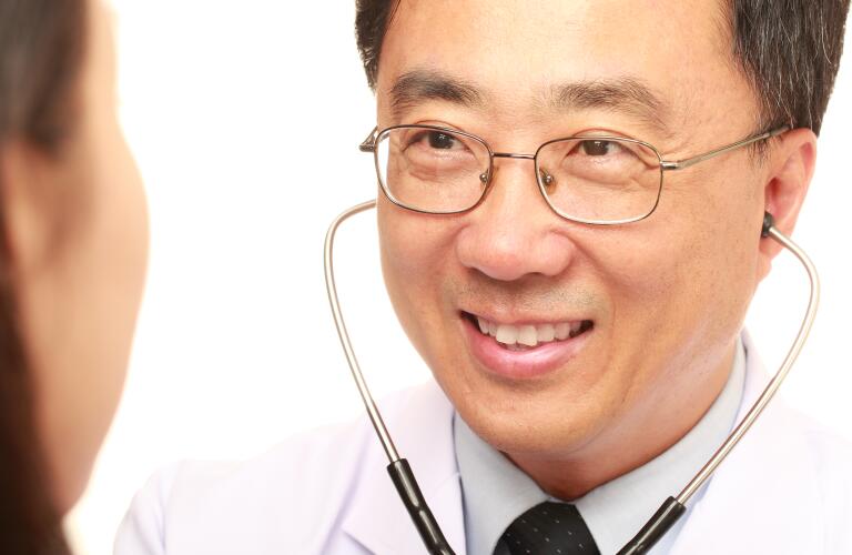Doctor talking with patient