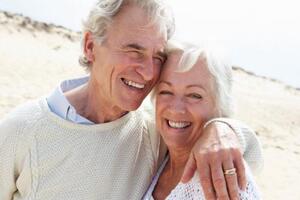 Happy couple on the beach